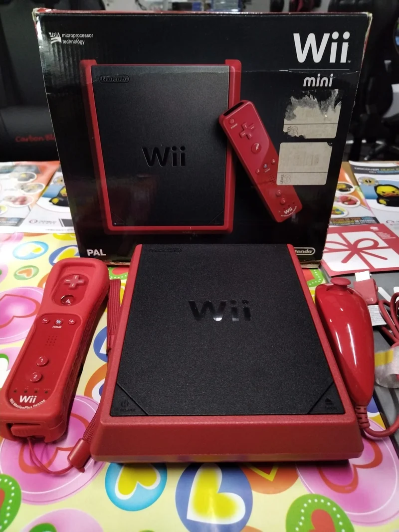 NINTENDO WII MINI ROSSA (usato garantito)(+ 2 GIOCHI )