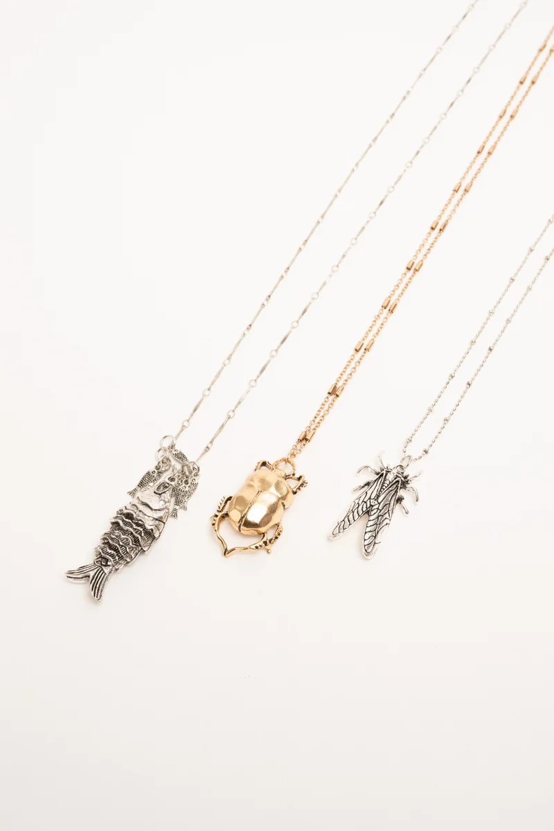 Set di tre collane con ciondoli Scarabeo oro e argento