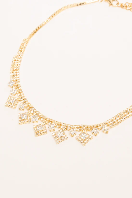 Collana in metallo dorato con pendenti in strass
