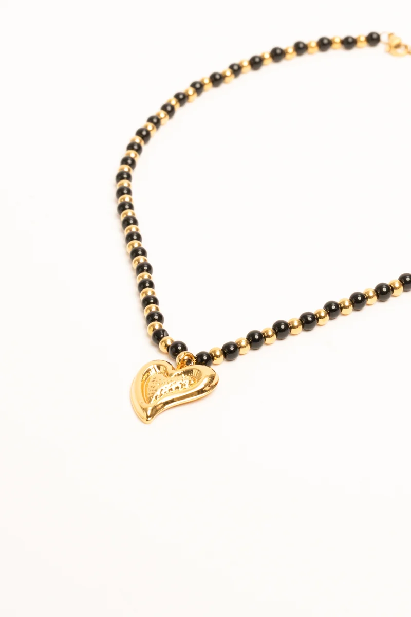 Collana con perline e pendente a cuore oro