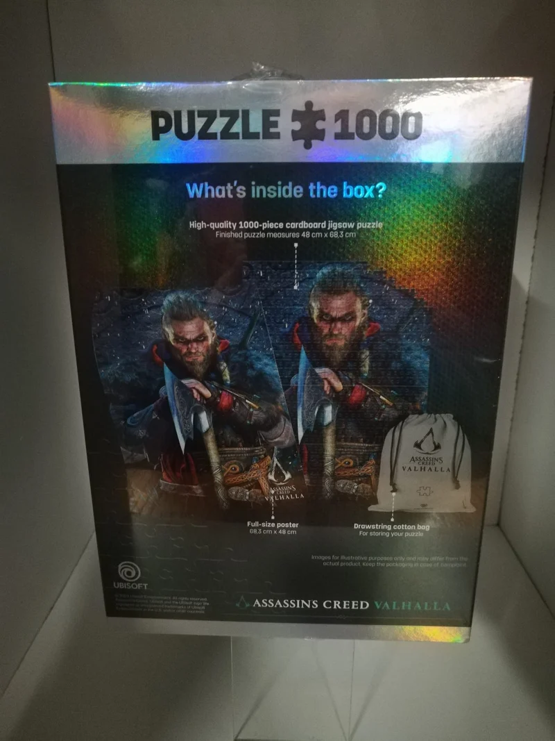 PUZZLE 1000 P.- ASSASSIN'S CREED VALHALLA +POSTER+BEG COTTONE