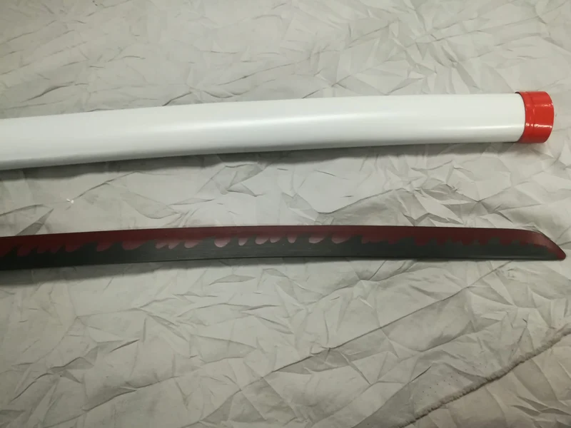 KATANA DEMON SLAYER-KYOJURO RENGOKU- CM 101 IN ACCIAIO SENZA FILO (da 16 anni in su)