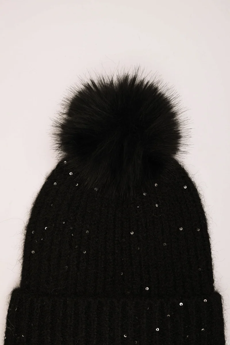 Berretto con pompon e paillettes