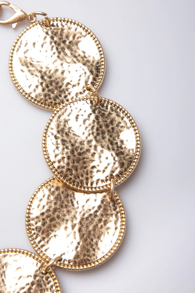 Collana con piastre circolari