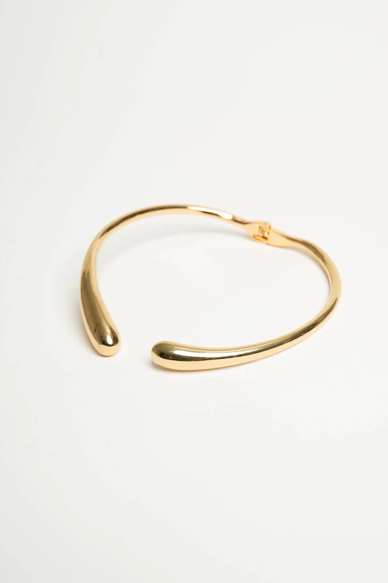 Collana rigida in metallo dorato