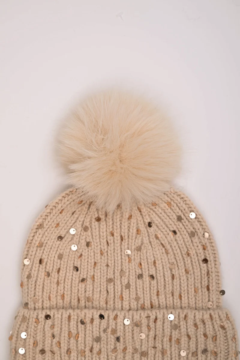 Berretto con paillettes e pompon