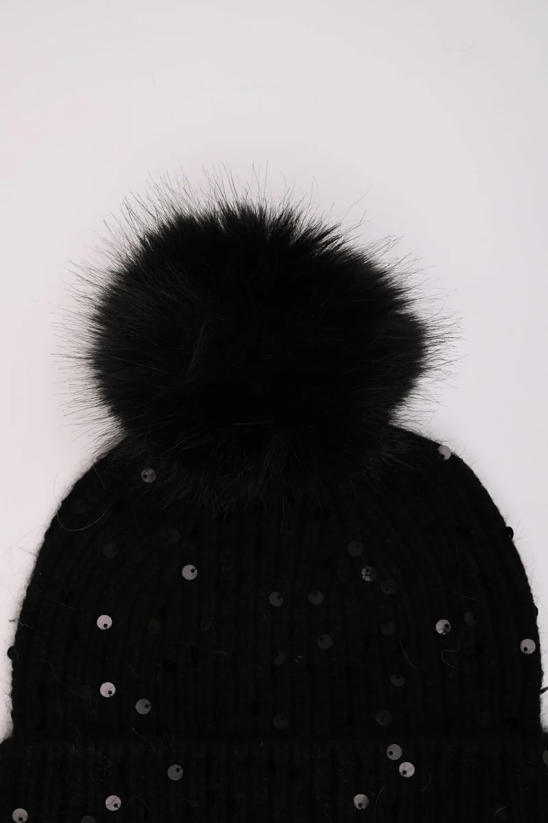 Berretto con paillettes e pompon