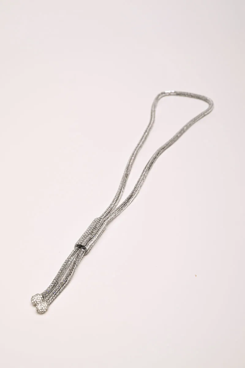 Collana lunga tubolare con strass