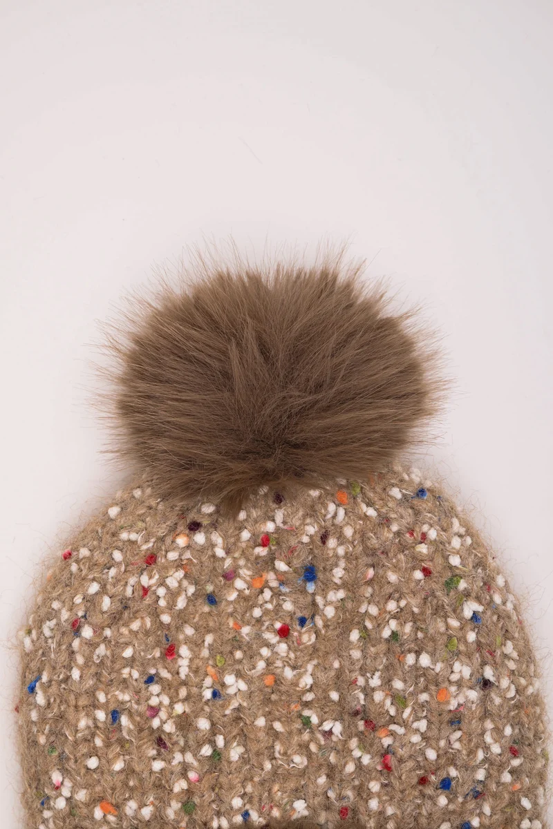 Berretto in maglia con pompon