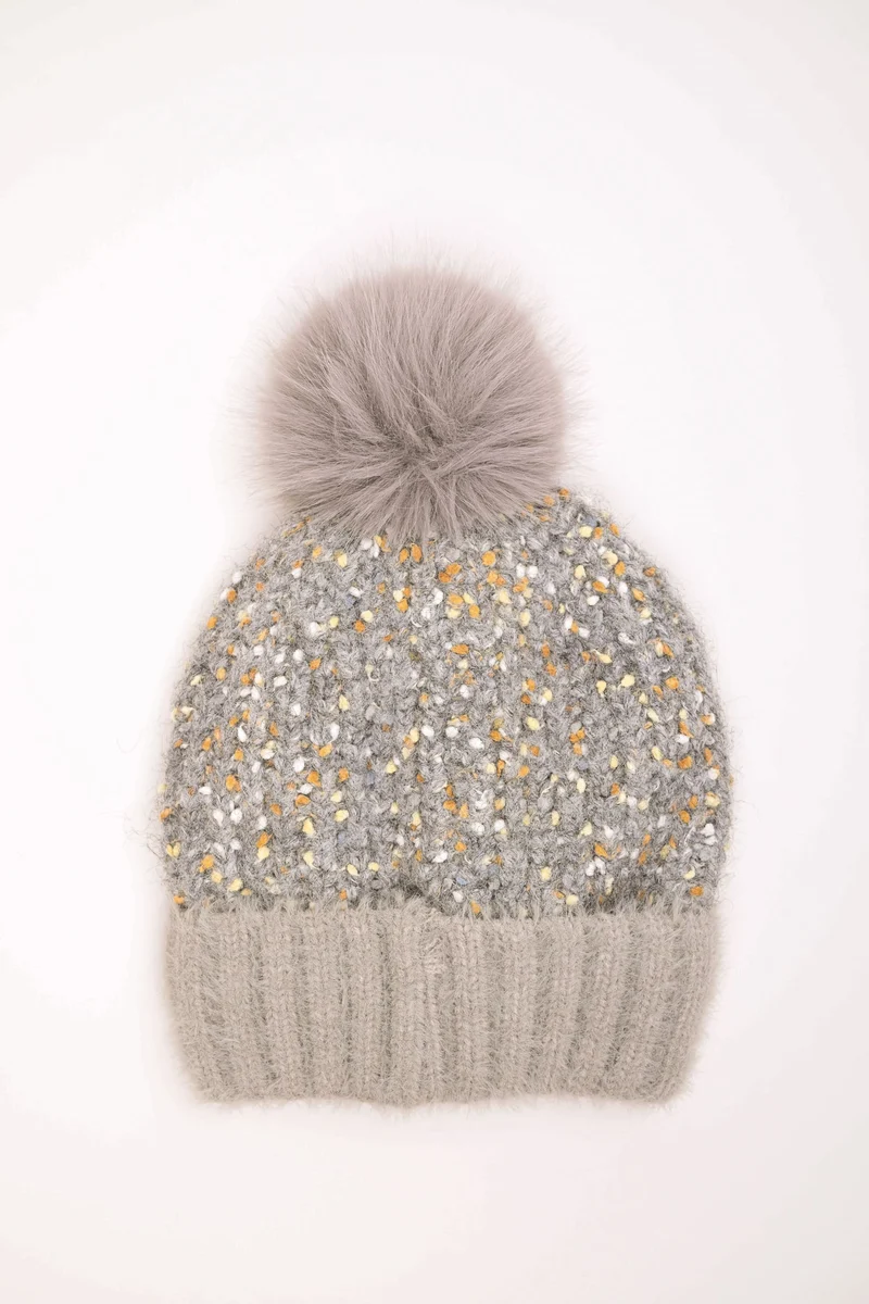 Berretto in maglia con pompon