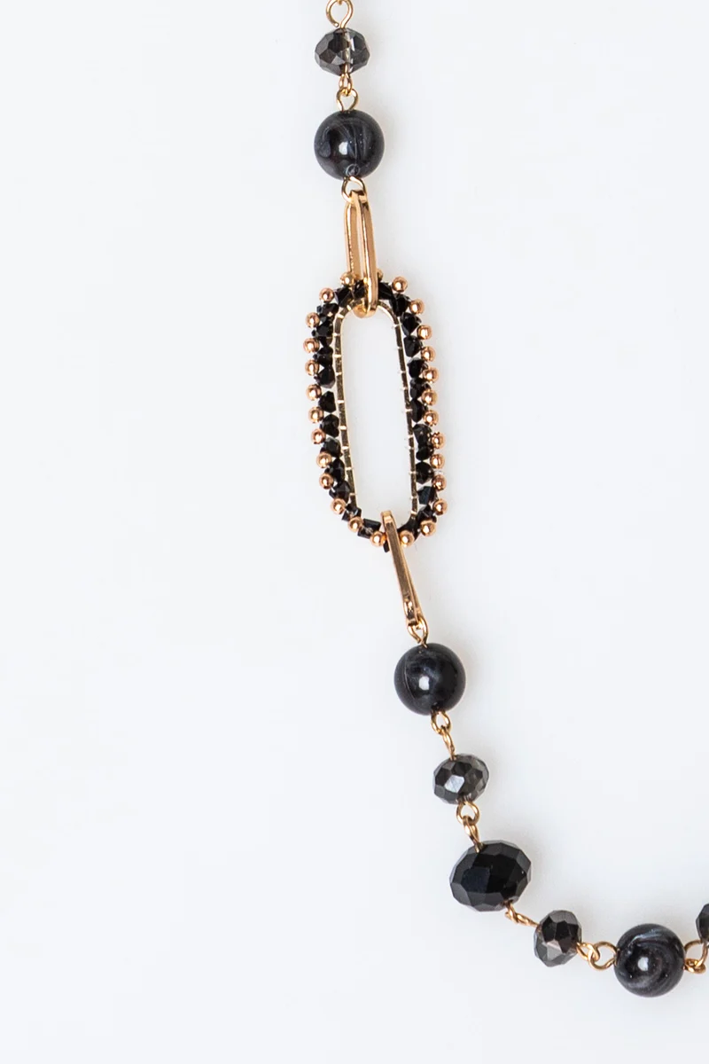 Collana lunga con decorazioni ovali