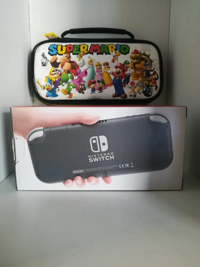 CONSOLE NINTENDO SWITCH LITE GRIGIA + MEMORY CARD 128GB + CUSTODIA (usato garantito)