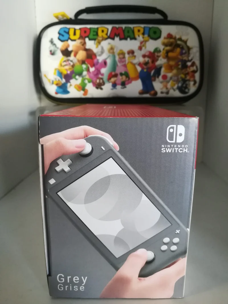 CONSOLE NINTENDO SWITCH LITE GRIGIA + MEMORY CARD 128GB + CUSTODIA (usato garantito)