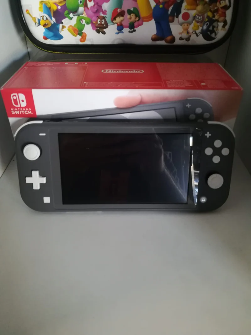 CONSOLE NINTENDO SWITCH LITE GRIGIA + MEMORY CARD 128GB + CUSTODIA (usato garantito)