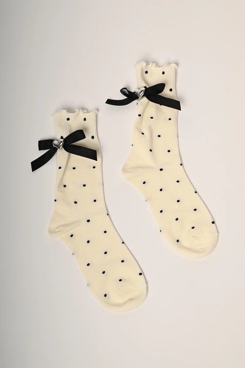 Set da due paia di calzini a pois con fiocchetti