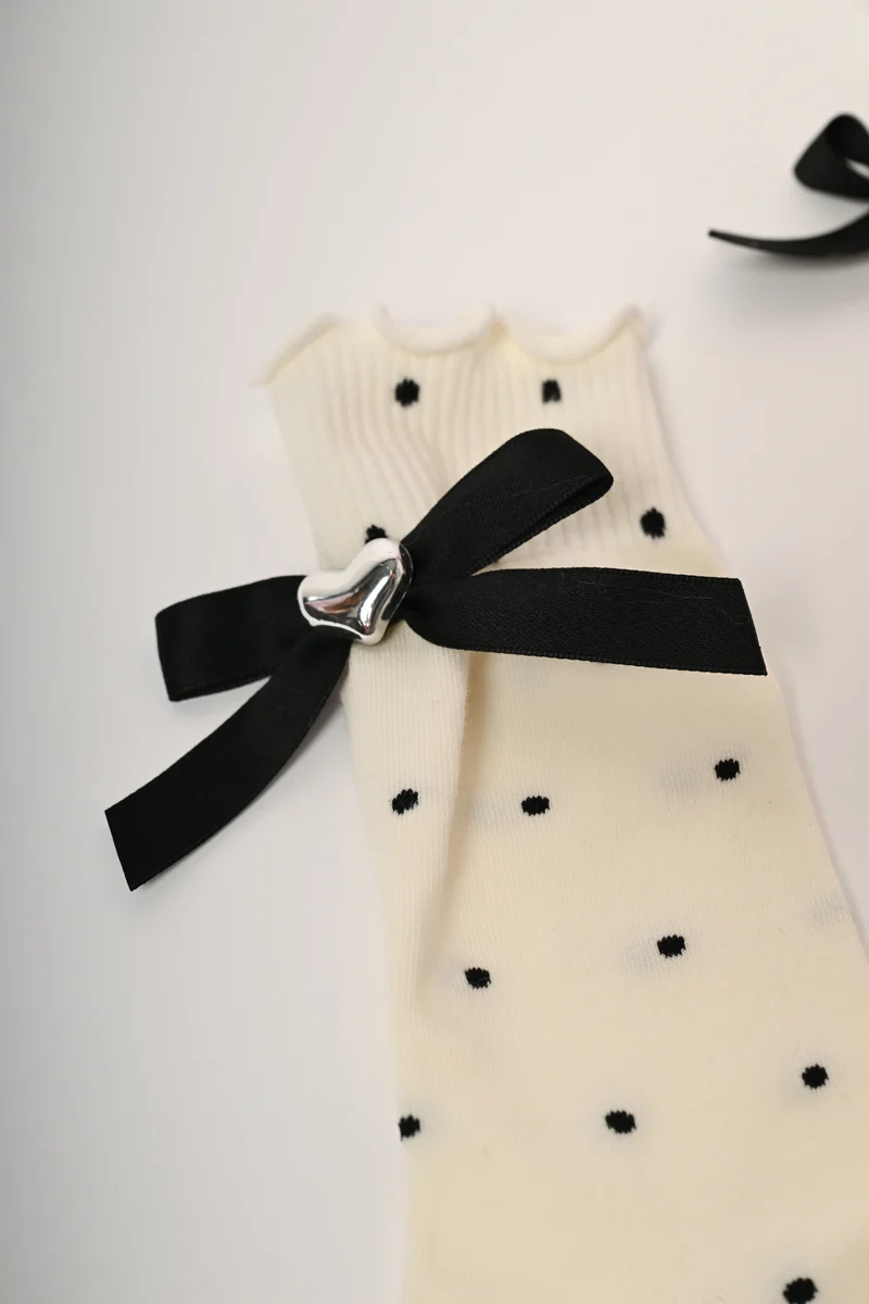 Set da due paia di calzini a pois con fiocchetti