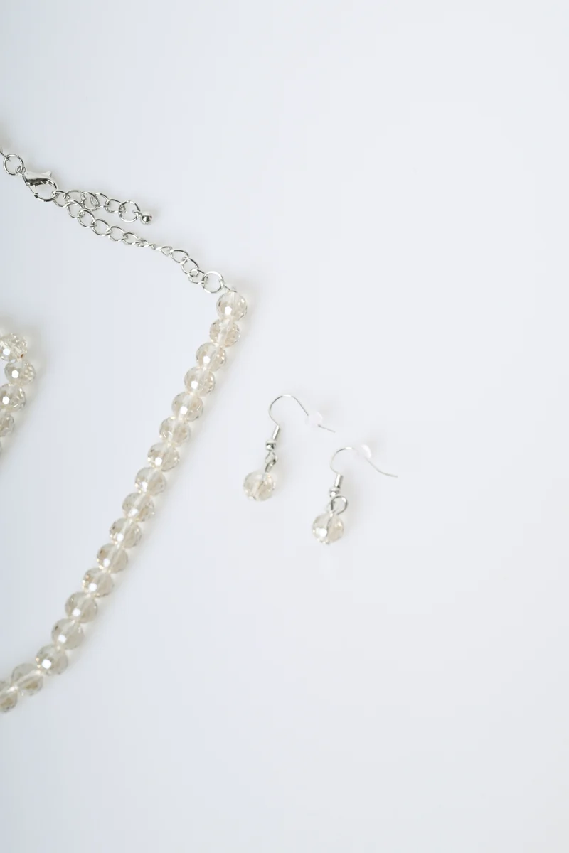 Set collana + orecchini + bracciale