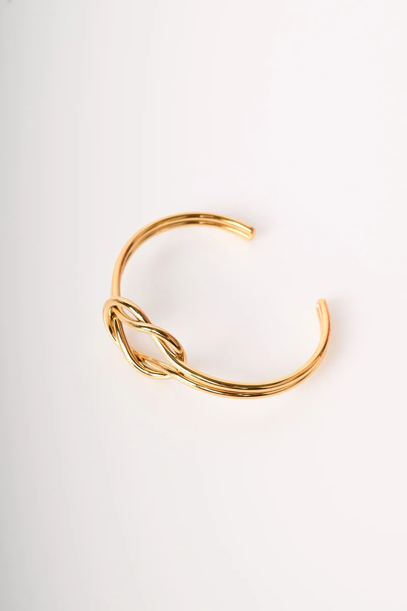 Bracciale rigido con intreccio